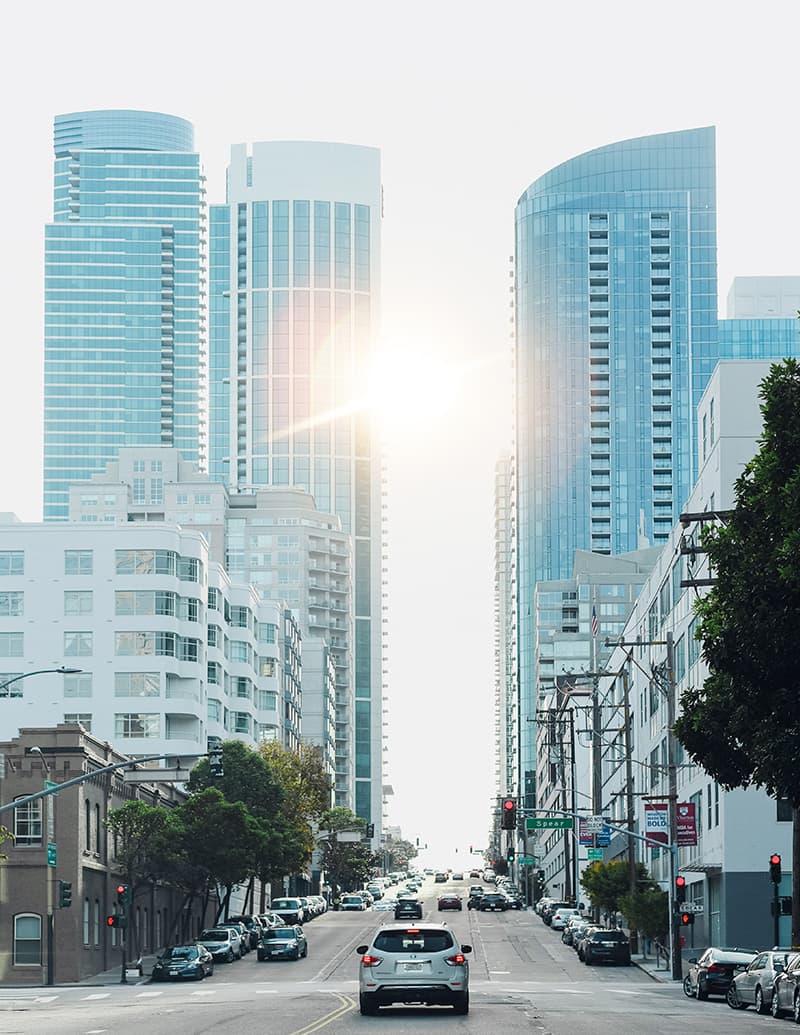 Glass office towers catching the morning sun